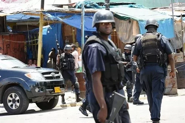 Police patrol on May 24, 2010 in Kingston, Jamaica