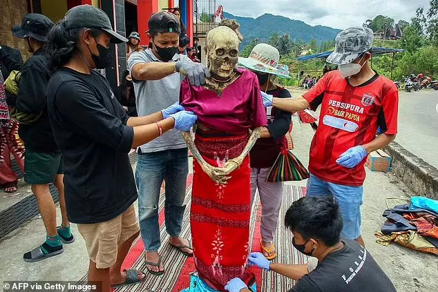 Mummified ancestors of a rural Indonesia tribe have been exhumed, spruced up and put on display as part of an intricate burial ritual