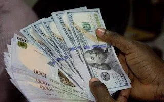 Naira strengthens, gains N29.89 against US dollar