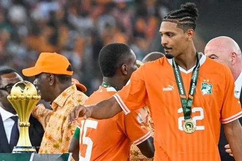 Sebastien Haller with the AFCON 2023 trophy - The Independent