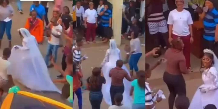 Moment bride arrives school in wedding gown to write her final exam