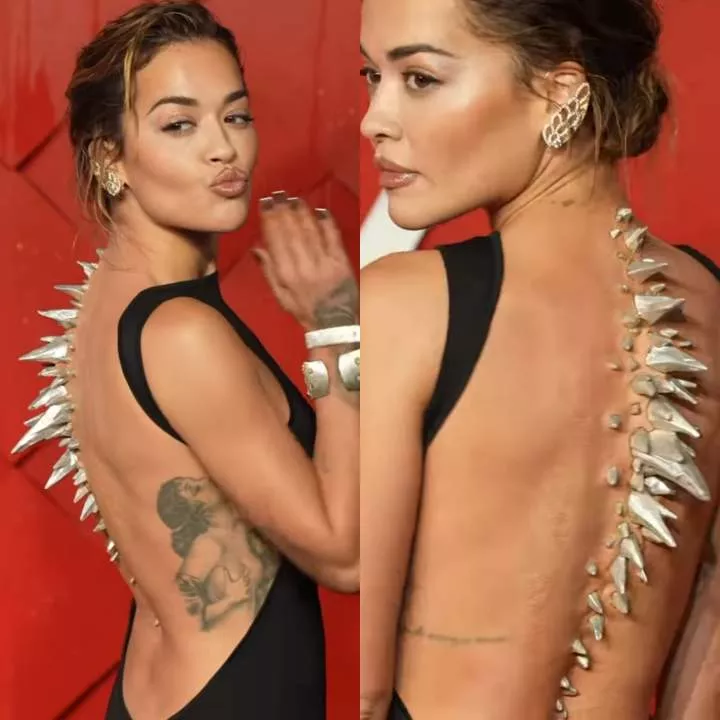 Rita Ora wears silver spikes down her back at the British Fashion Awards 2023 (photos/video)
