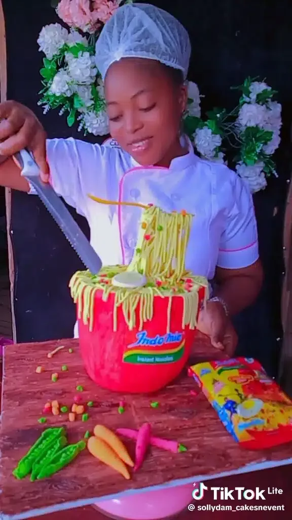 'You are too creative' - Talented baker sets tongues wagging, shows off beautiful Indomie cake (Video)