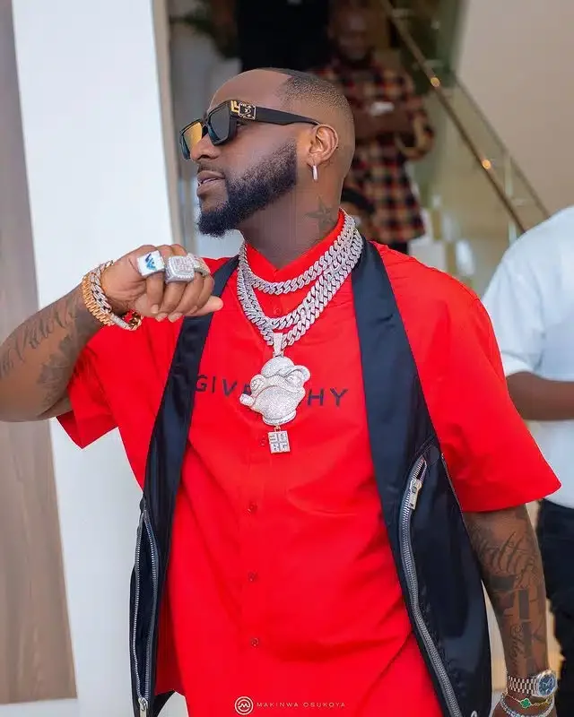 Davido gifts one of his crew members a new car