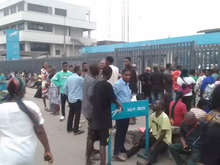 Naira scarcity: Delta residents keep vigil in banks (Photos)