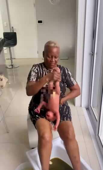 "So emotional" - Netizens react to video of Omashola's fiancée shedding tears as grandma massages her son