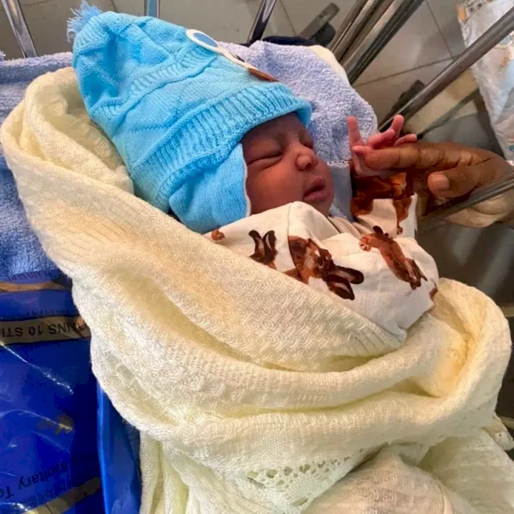 'I call this cutie a miracle baby' - Man rejoices as wife gives birth two years after taking-in