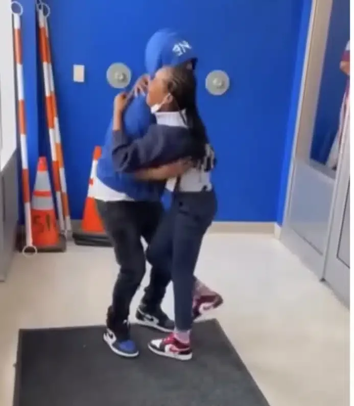 Touching moment young girl breaks down in tears as she reunites with father wrongfully imprisoned for 16 years