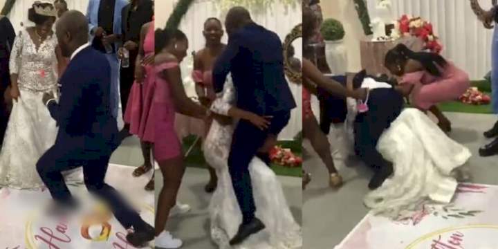 Moment couple suffered embarrassing fall while dancing at their wedding reception (Video)