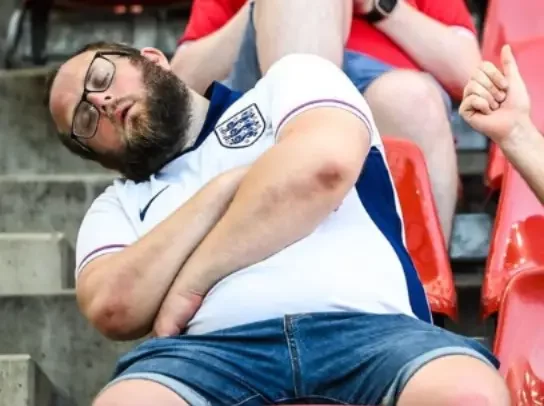 Fan caught sleeping during England's game says he dreamt Three lions won the Euro