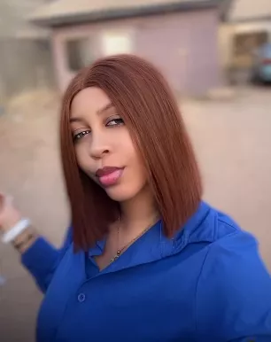 Lady displays what happened to her bone straight wig after entering keke