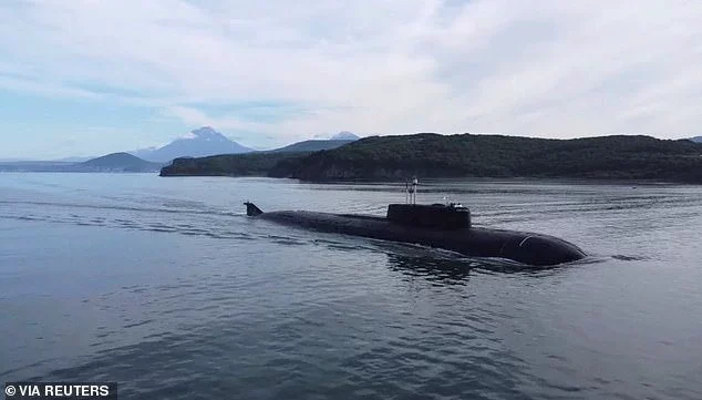 A still image from video, released by the Russian Defence Ministry, shows what it said to be a Russian nuclear-powered submarine sailing during the military drills Umka-2022 in the Chukchi Sea in September 2022