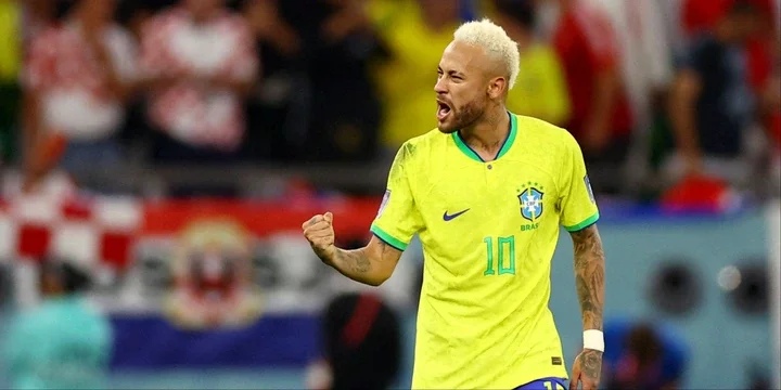 Neymar celebrates scoring for Brazil. 