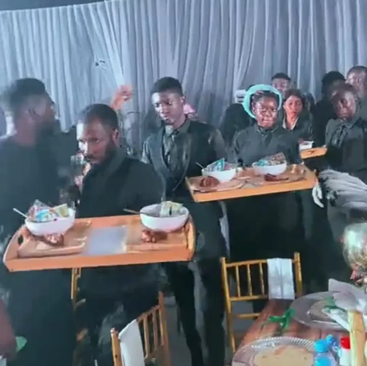 Nigerian couple goes viral for serving garri, kuli at wedding