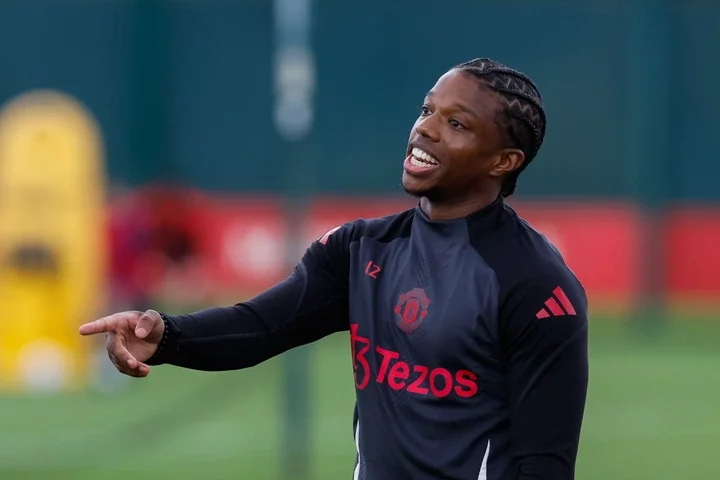 Tyrell Malacia of Manchester United looks on during the training session ahead of the UEFA Europa League 2024/25 League Phase MD1 match between Man...