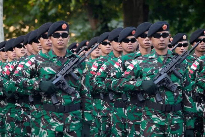 Indonesian troops march during a rehearsal for Bastille Day