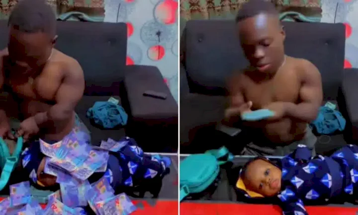 'He go still pack am' - Video trends as Shatta Bandle sprays wads of cash on his newborn