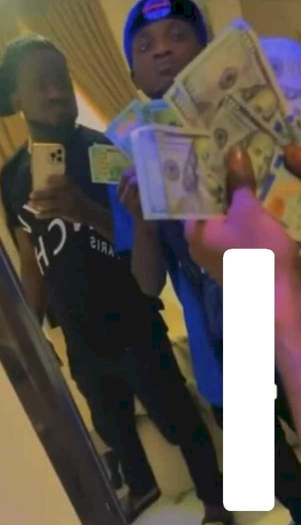 Portable's priceless reaction after receiving dollar bills from Davido (Video)