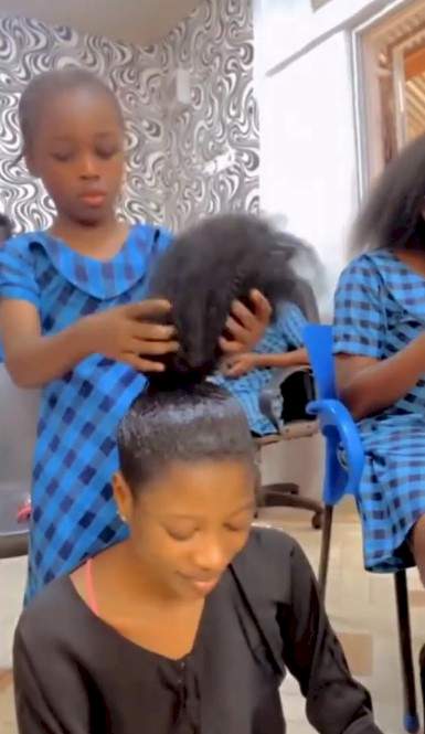 Viral Video: Little girl shocks netizens with impressive hairdressing talent (WATCH)