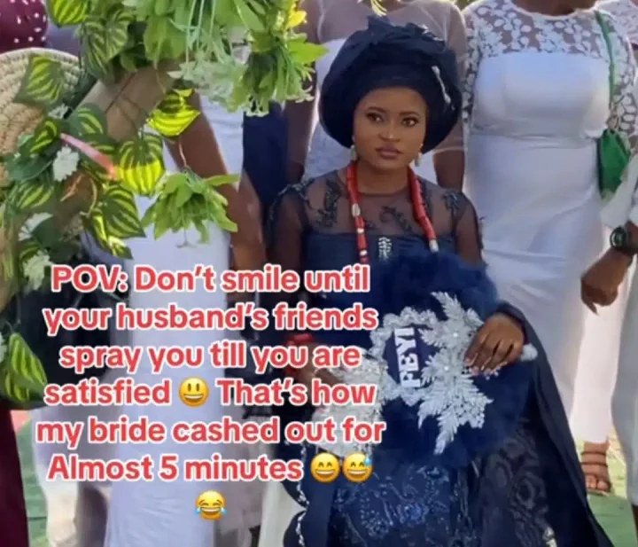 'If I laugh, make I bend' - Bride refuses to smile until groom, friends shower her with cash on wedding day