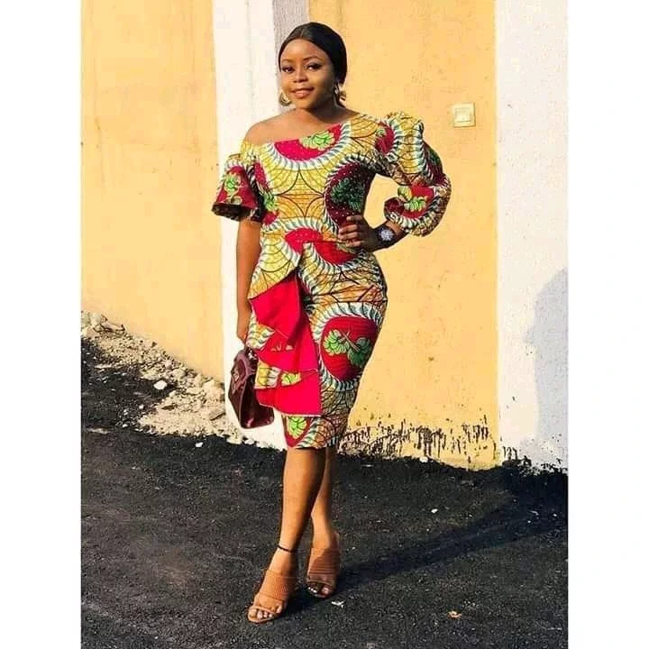 Attractive Short Ankara Gowns for Ladies Who Love to Flaunt Their Adorable Legs.