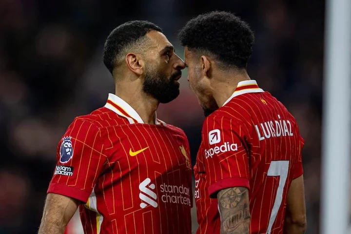 LIVERPOOL, ENGLAND - Saturday, November 2, 2024: Liverpool's Mohamed Salah (L) celebrates with team-mate Luis Díaz after scoring the second goal during the FA Premier League match between Liverpool FC and Brighton & Hove Albion FC at Anfield. (Photo by David Rawcliffe/Propaganda)