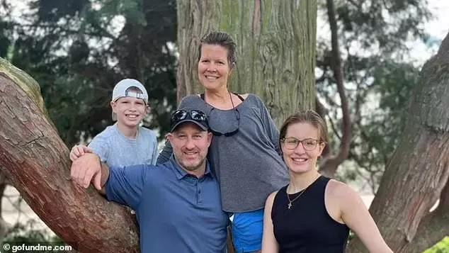 Pastor is shot dead in his driveway in front of his wife and two children during fight with neighbour