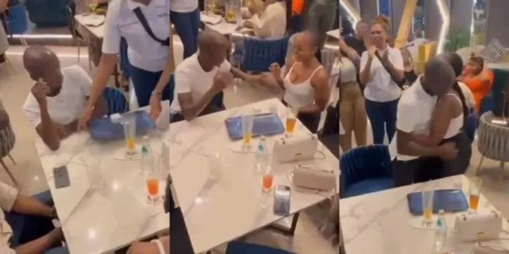Lady surprises her man as she proposes to him at restaurant