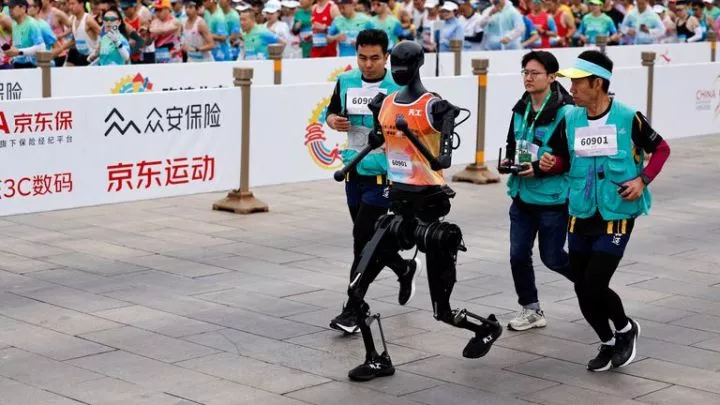 A robot races against humans. Pic: Reuters