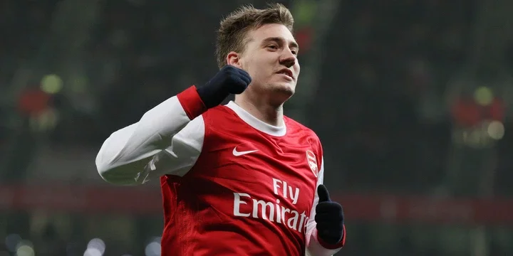 Nicolas Bendtner celebrates scoring for Arsenal.