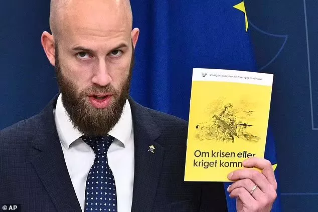 Sweden's Minister for Civil Defence Carl-Oskar Bohlin presents the new version of the booklet 'If Crisis or War Comes