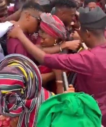 Super Eagles star Taiwo Awoniyi cries as he blesses his twin sister's traditional marriage