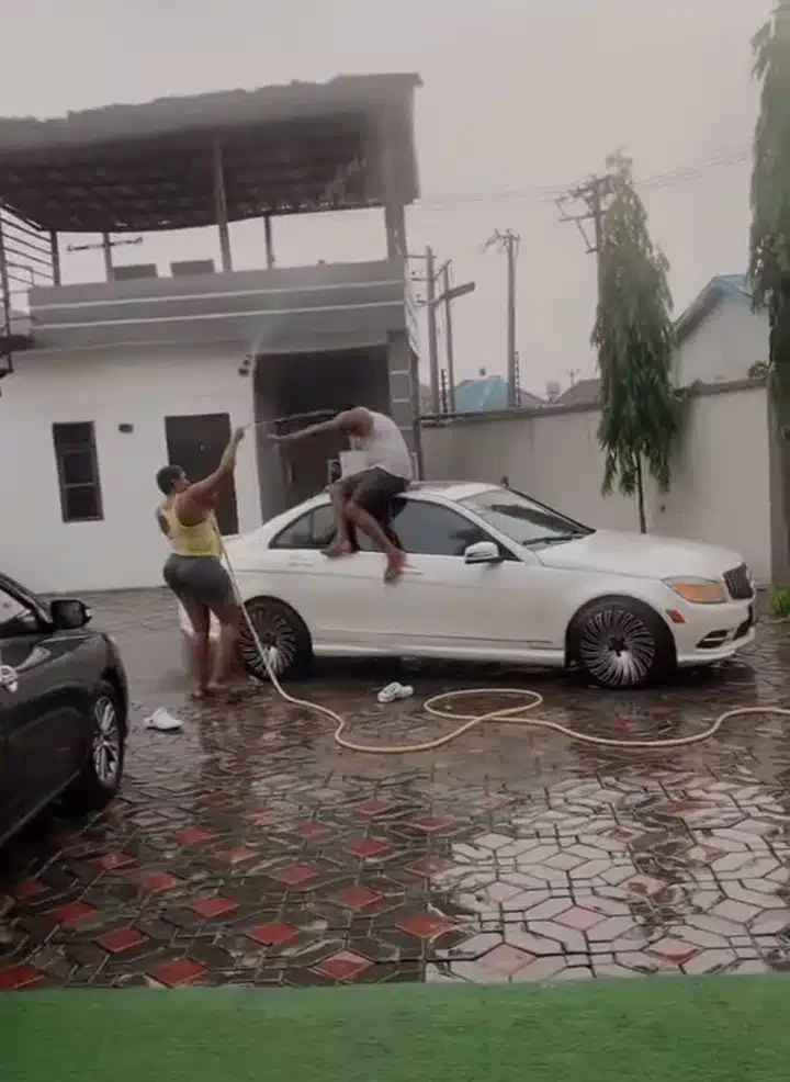 'Is your mum single?' - Little girl laments as she sees her parents playing under rain