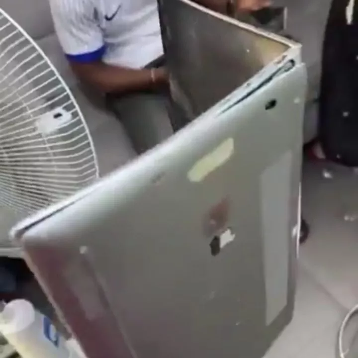 Gadget seller shocked as couple destroys pricey laptop and iPhone in anger, shares video