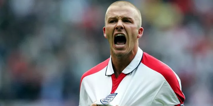 England captain David Beckham clutches the badge