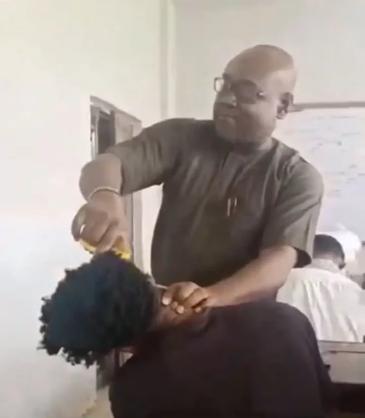 Outrage as Unizik lecturer trims student's trendy hairstyle with scissors