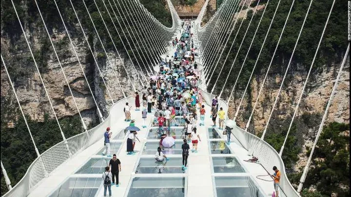 See How The Chinese Glass Bridge Was Tested Before People Were Allowed To Cross (Photos)