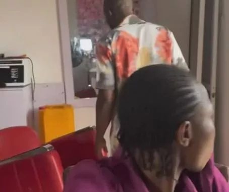 Lady engages in a heated exchange with ex-boyfriend who stormed her store with a friend to take back all he bought for her following the end of their relationship (Video)