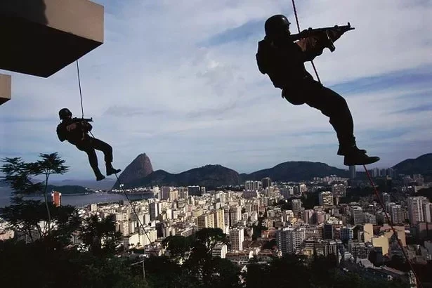 BOPE abseiling as part of their rigorous training to combat the drugs trade