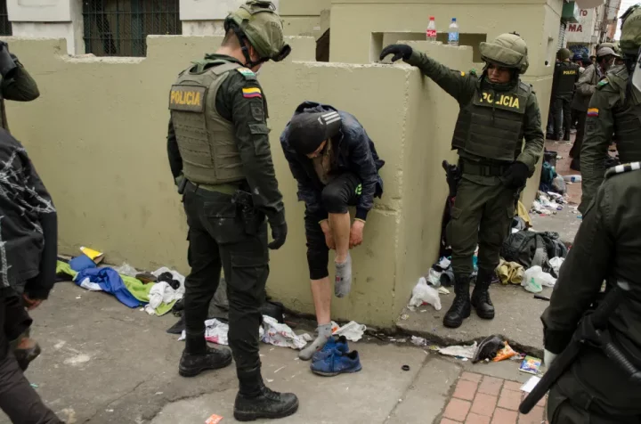 Police found children living in drug-filled squalid conditions run by gangs in Bogota, Colombia in 2016