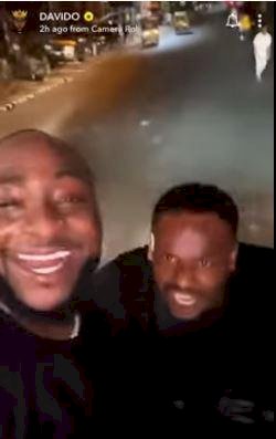 Davido hits the streets of Onitsha as actor, Zubby Michael clears the road for him (Video)