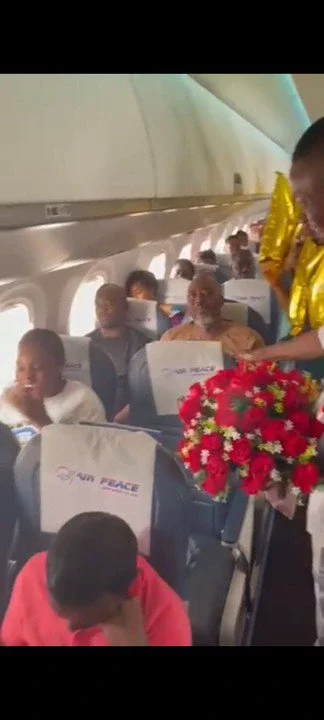[Photos] Nigerian Man Proposes To Girlfriend Mid-Air On Air Peace Flight