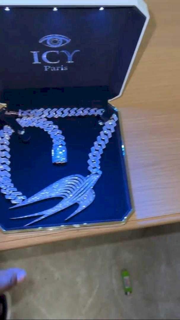 Davido receives millions of naira worth diamond necklace, and a barrel of whiskey from Martell Cognac (Video)