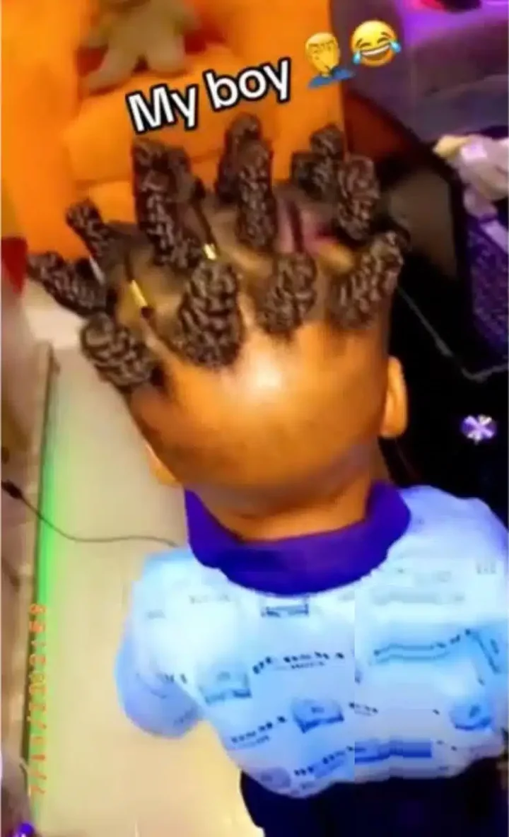 'This child won't be able to sleep' - Outrage as parent plaits son's hair (Video)