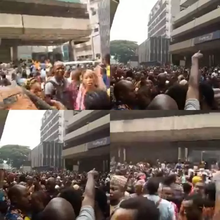 Massive crowd at CBN office in Lagos state as Nigerians struggle to deposit their old N500 and N1000 notes (video)
