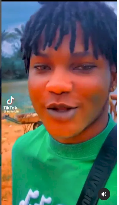Man brags about money ritual as a priestess carries out a ritual by a river bank (video)