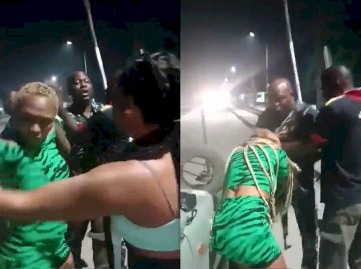 Lagos police officers caught on camera assaulting lady for attempting to record them during a confrontation with an Uber driver