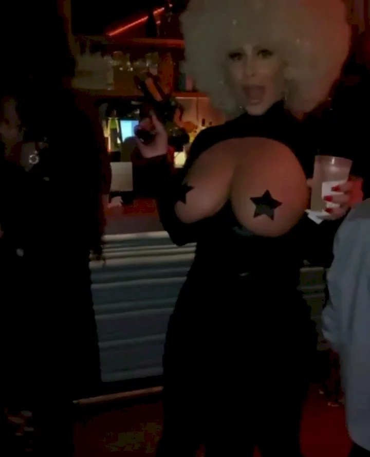 Amber Rose's b**bs hang out of her interesting Halloween costume