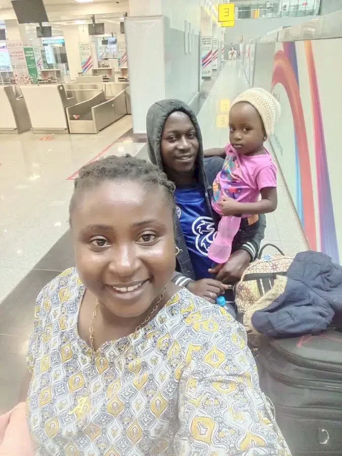 Lady overjoyed as she relocates abroad with family