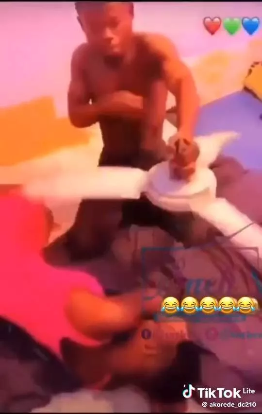 Nigerian Man Fan Girlfriend  'Love is sweet' - Nigerian man uses unconnected ceiling fan to fan his sleeping girlfriend; video creates buzz